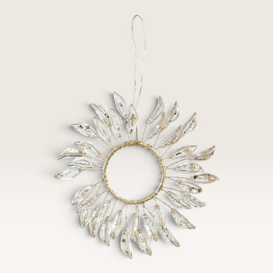 Vintage Industrial gold leaf-shaped hanging ornament with a circular wire frame for Christmas decoration.