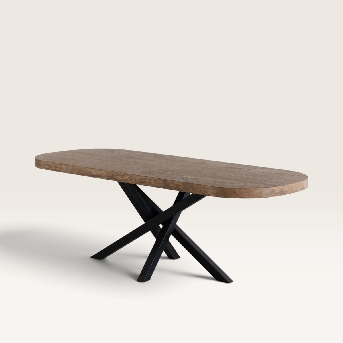 Vintage Industrial Batac dining table with a solid honey-finished pine top and black metal crossed legs