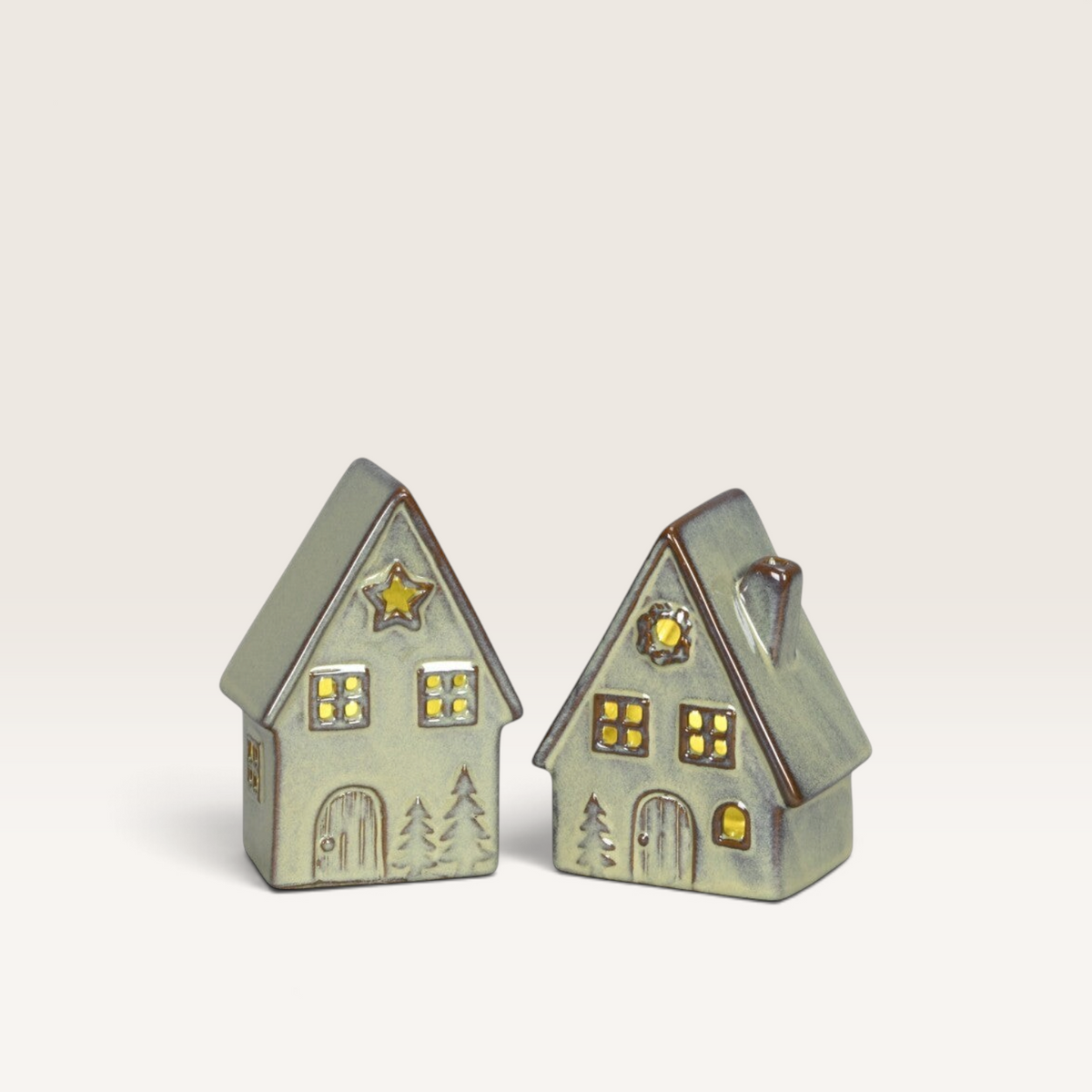 Vintage Industrial green porcelain house miniatures with warm LED lighting and festive star and tree details.