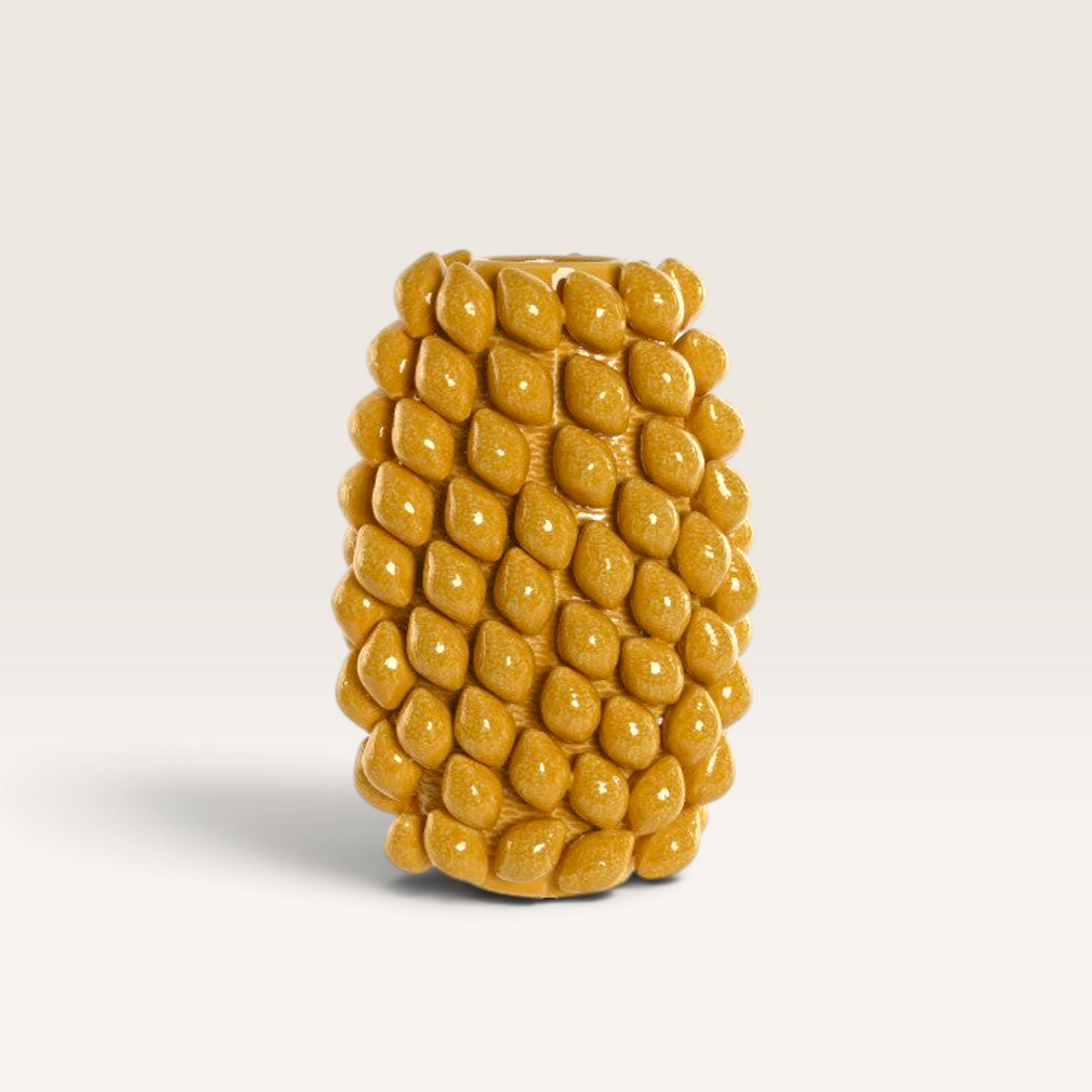 Vintage Industrial Isak stoneware vase in lemon yellow with a textured, leaf-like pattern for modern home decor.