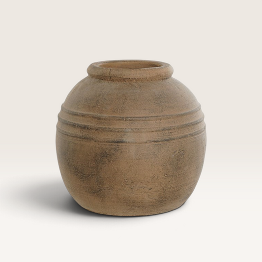 Vintage Industrial Khalil cement vase with a rustic brown textured finish and rounded artisanal design.