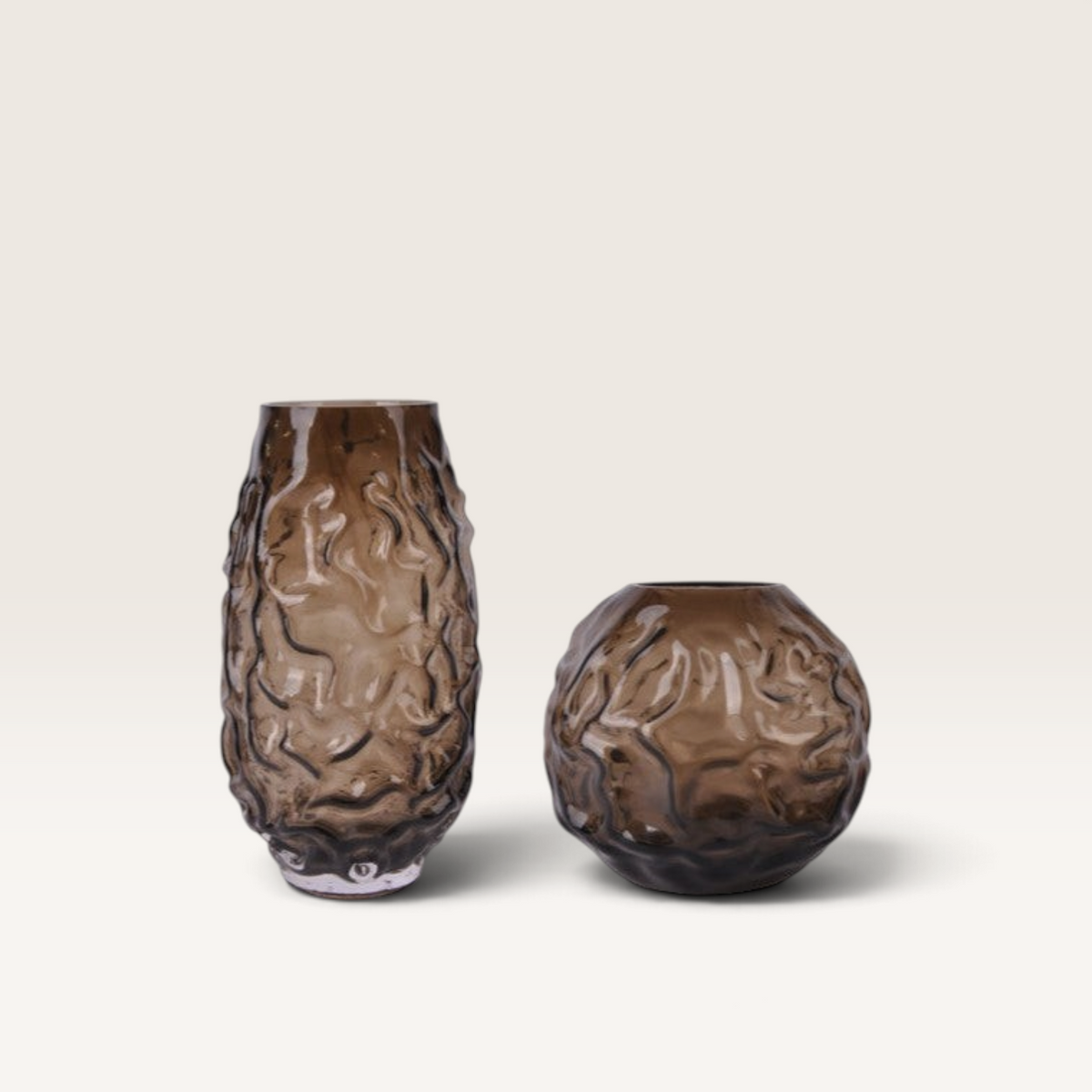 Vintage Industrial Kashi brown glass vases with a textured, organic rippled surface in tall and round shapes.