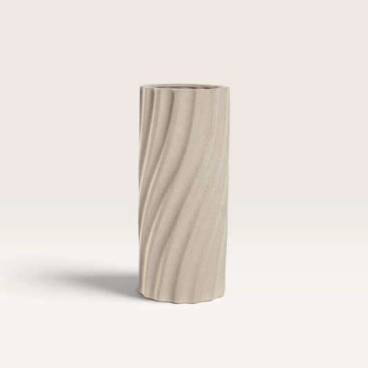 Vintage Industrial Komo white porcelain vase with a tall, cylindrical shape and textured spiral fluted design.