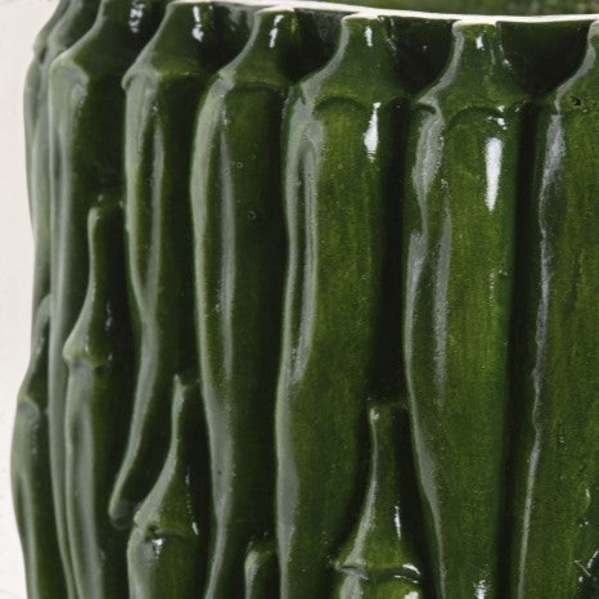 Vintage Industrial Kobi vase in pepper green magnesia with a textured, sculptural design for indoor or outdoor decor.