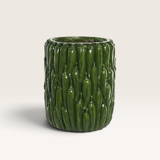 Vintage Industrial Kobi vase in green pepper-shaped magnesia, a durable decorative piece for indoor or outdoor use.