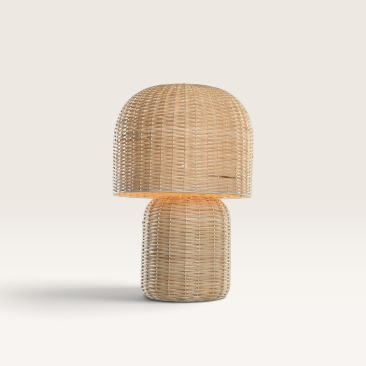 Vintage Industrial Kamar table lamp made of natural beige rattan with a woven dome shade and cylindrical base.