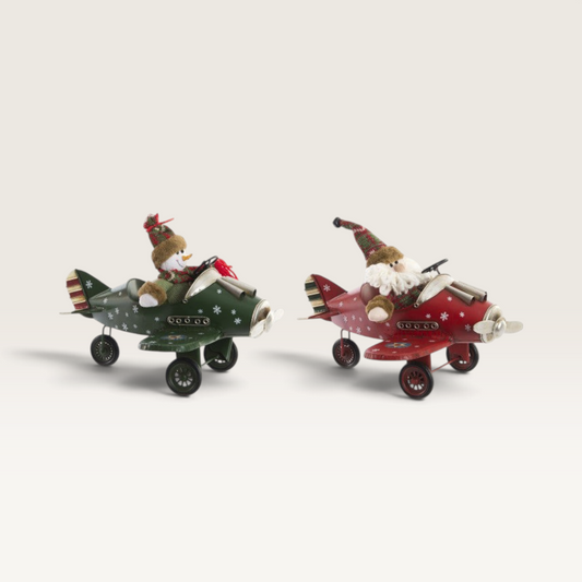 Dos aviones decorativos de metal Vintage Industrial con muñeco de nieve y Santa Claus, estilo navideño artesanal.