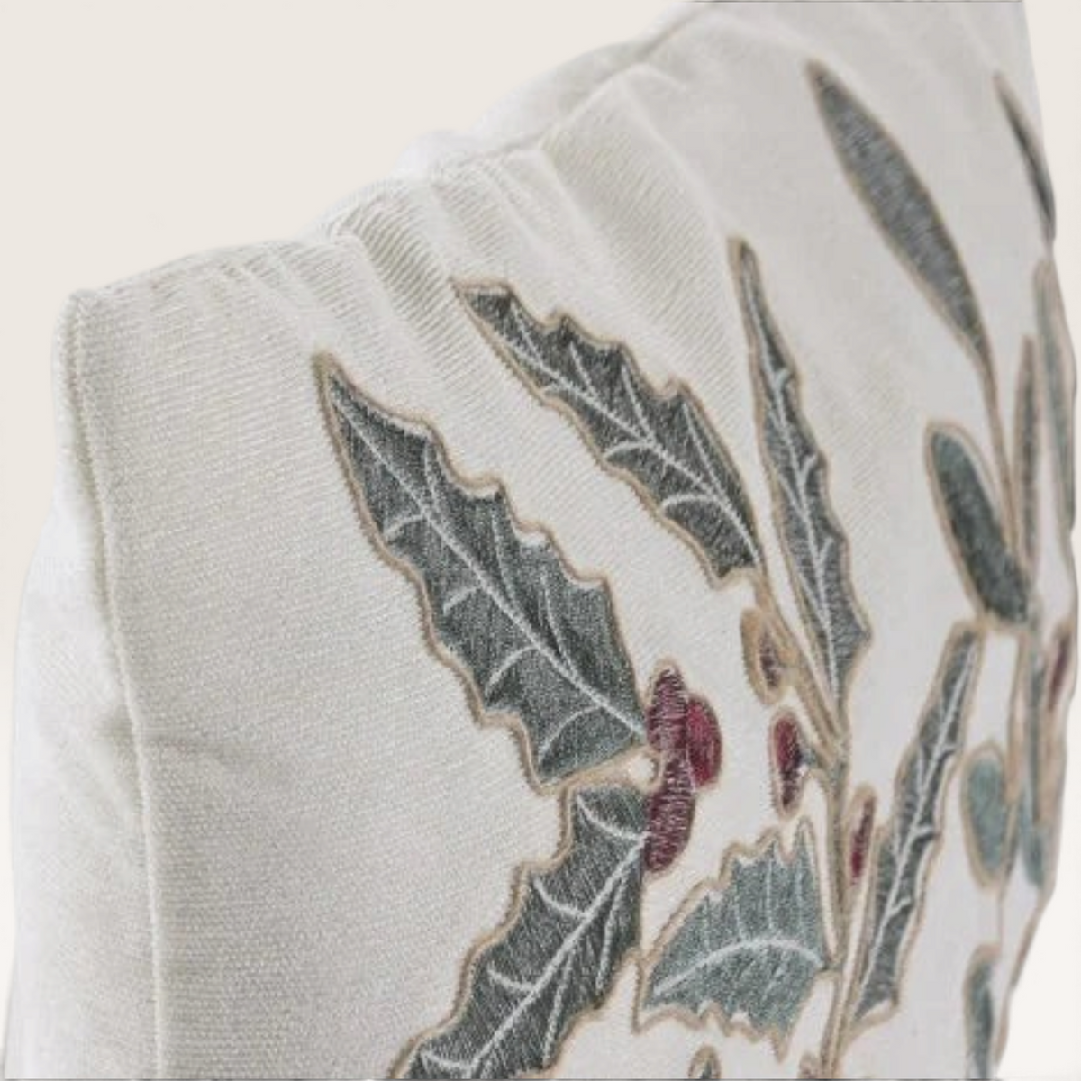 Vintage Industrial Ambon cushion cover with embroidered holly leaf and berry design on cream polyester fabric