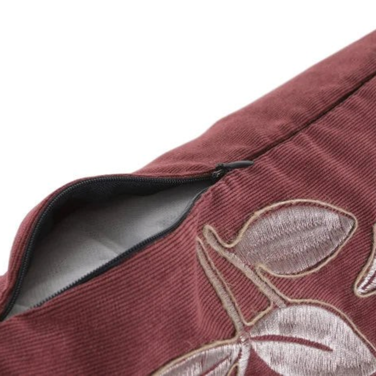 Vintage Industrial Ambon cushion cover in burgundy corduroy with embroidered leaf detail and side zipper closure