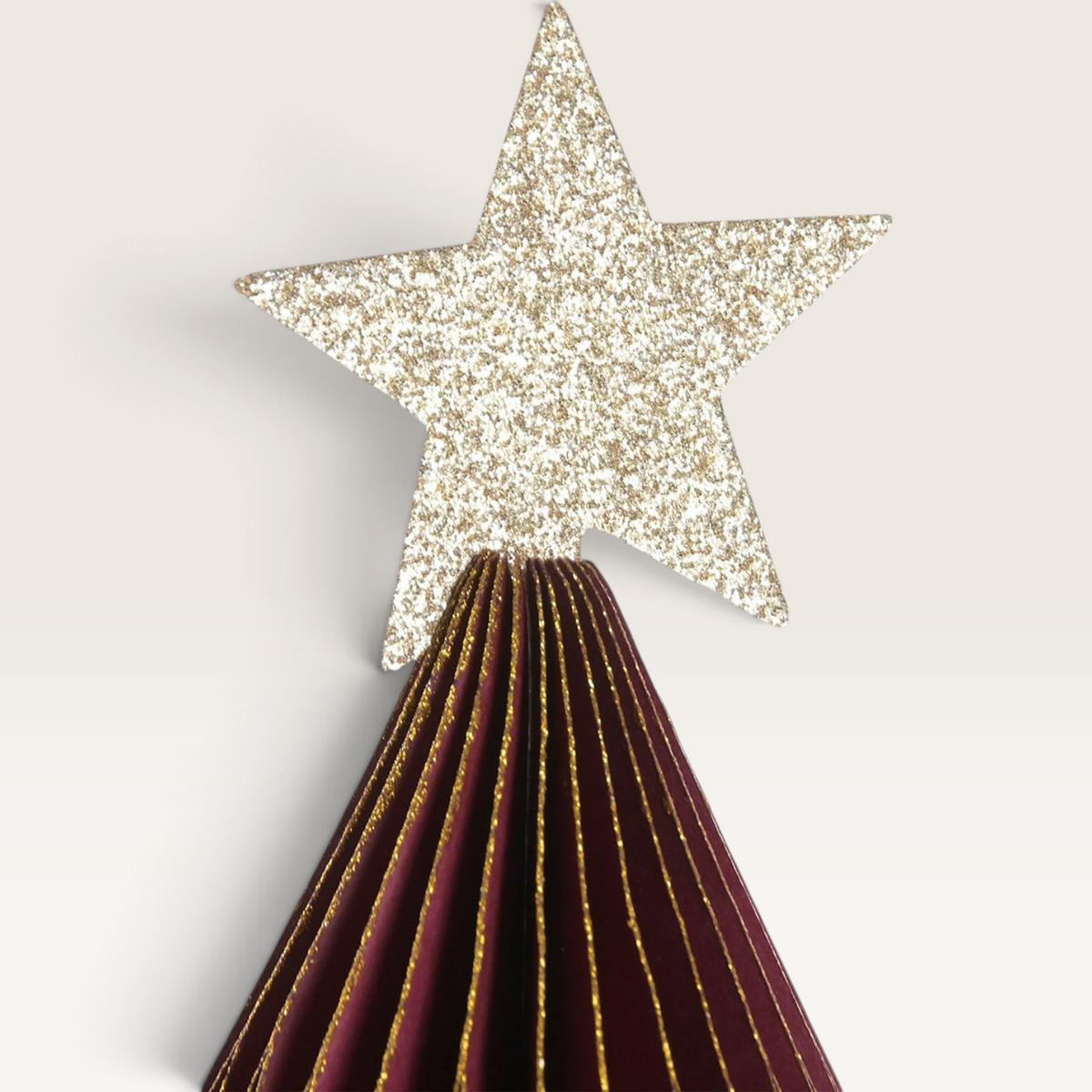 Vintage Industrial Bima decorative red paper Christmas tree with a glittery gold star topper