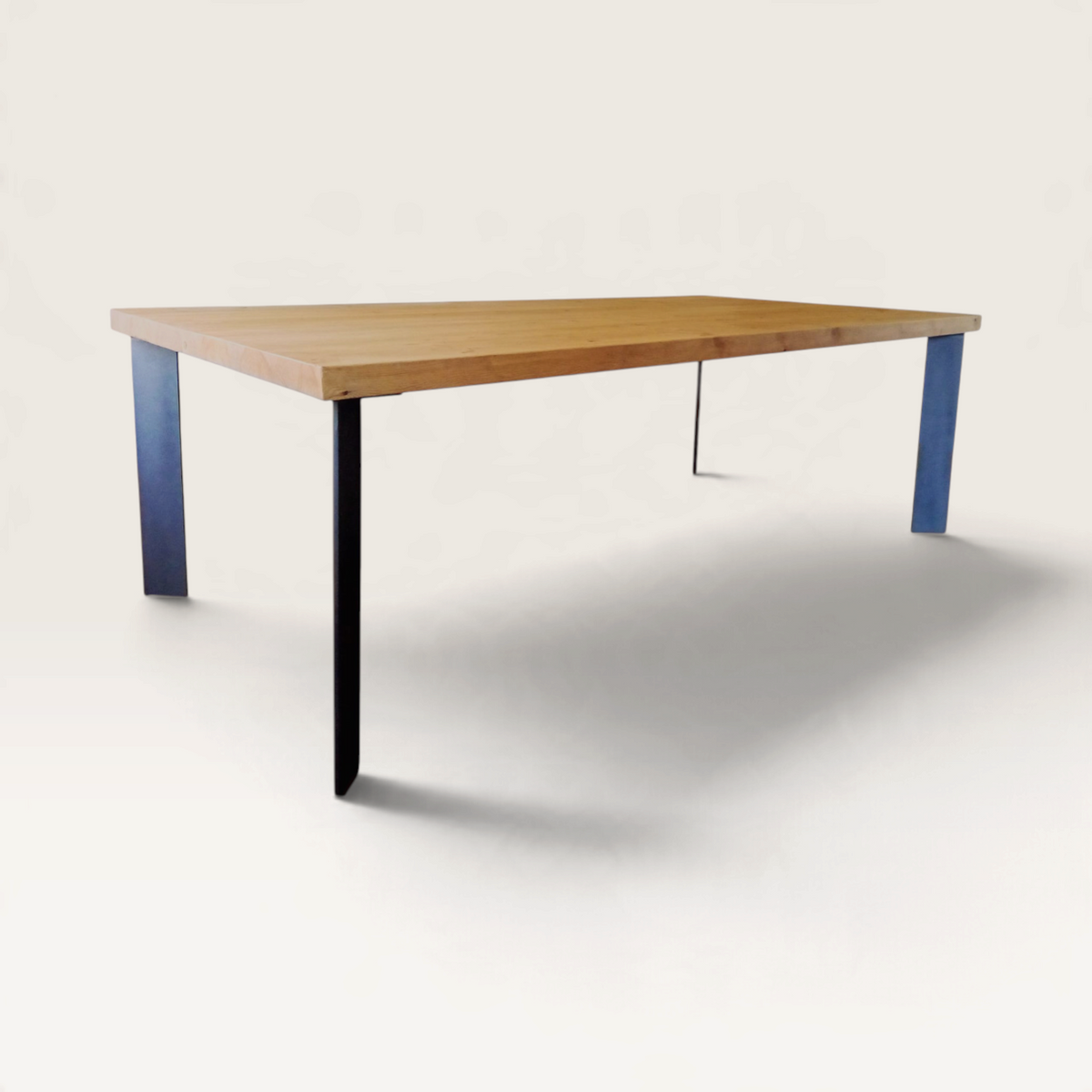Vintage Industrial Kalumi dining table with a solid pine wood top in arena finish and black iron legs.