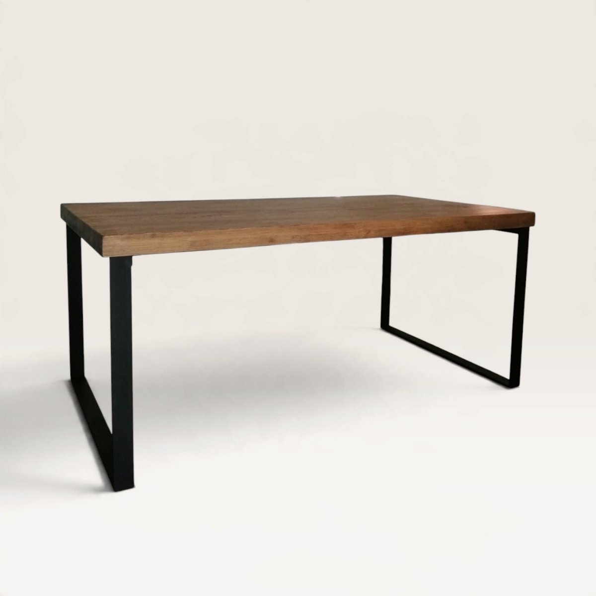 Vintage Industrial Sut dining table with honey-finished solid pine wood top and black iron frame in a home setting