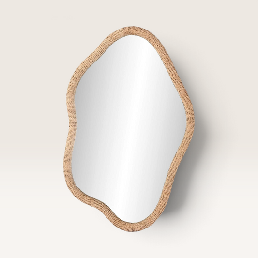 Vintage Industrial Riom mirror featuring an organic, irregular shape with a natural woven rattan frame.