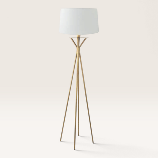 Vintage Industrial Diane floor lamp with a gold tripod base and a white drum shade for warm ambient lighting