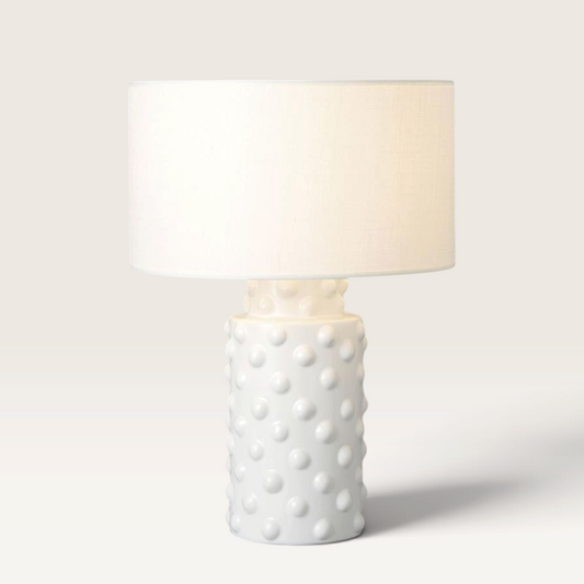 Vintage Industrial Katrina table lamp with a white ceramic base featuring a textured dot pattern and matching shade.