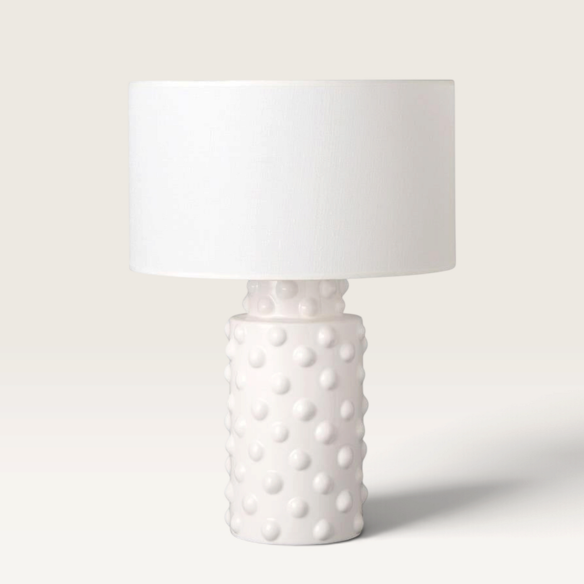 Vintage Industrial Katrina table lamp with a white ceramic base featuring a textured dot pattern and matching shade.