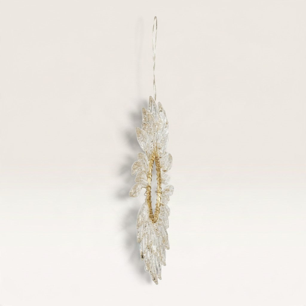 Vintage Industrial Aureo gold-toned hanging ornament with delicate leaf-like design for elegant holiday decor.