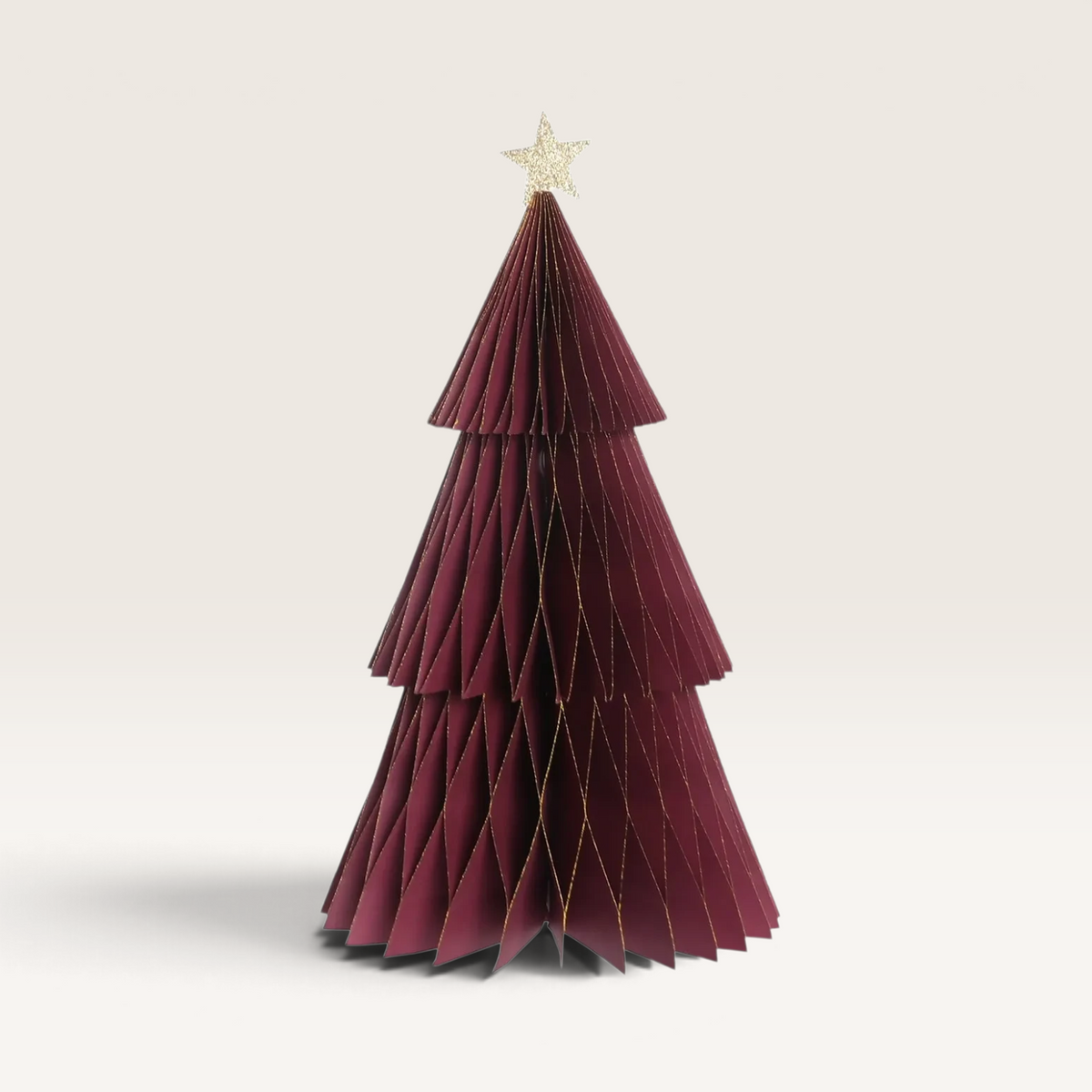 Vintage Industrial Bima paper Christmas trees in dark green and red with gold star toppers and rustic pleated design.