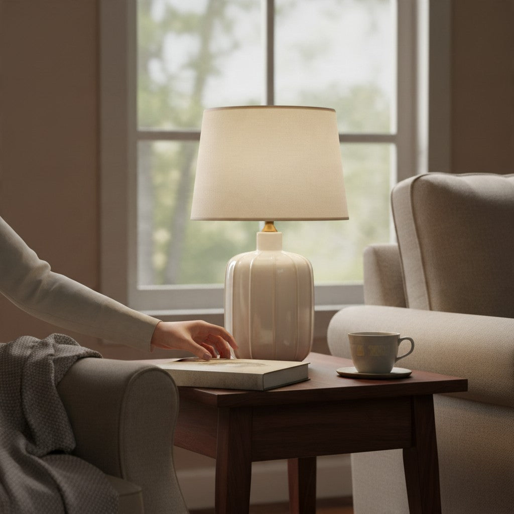Vintage Industrial Lumi table lamp with a white ribbed ceramic base and fabric shade on a wooden side table.