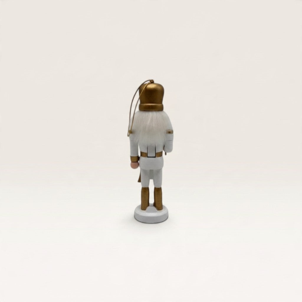 Vintage Industrial hanging nutcracker ornament in white and gold MDF with faux fur beard, back view