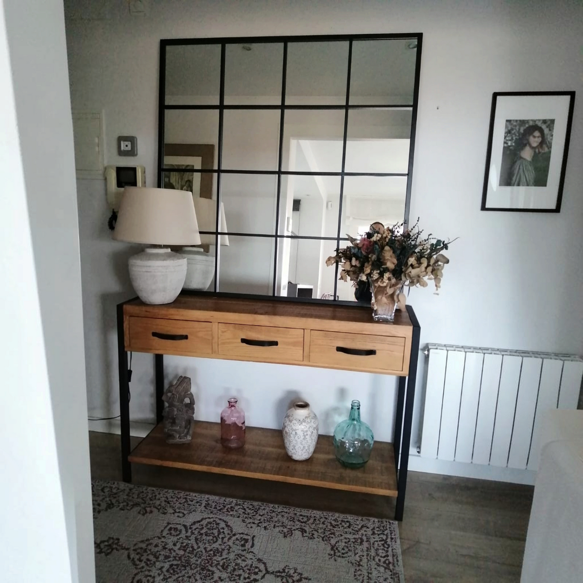 Vintage Industrial Runque entryway console table in solid pine wood with three drawers and black iron frame.